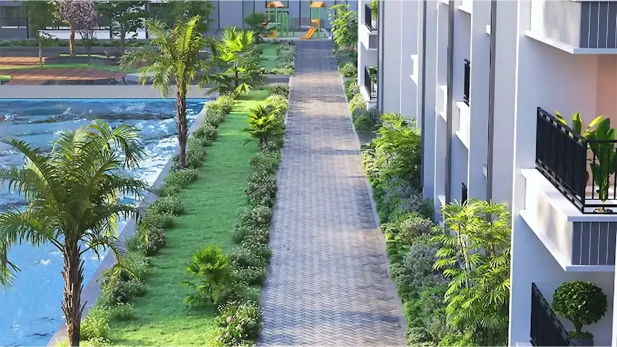 Luxury swimming pool area at SOBHA Madison Heights Townpark in Krishnasagara Bengaluru with modern high-rise towers at night