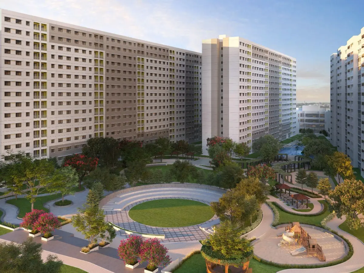 Exterior view of Sobha Ayana featuring modern residential towers surrounded by lush greenery and landscaped gardens